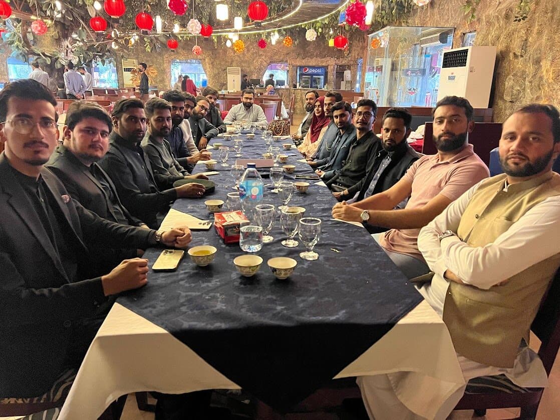 The team at dinner after a release